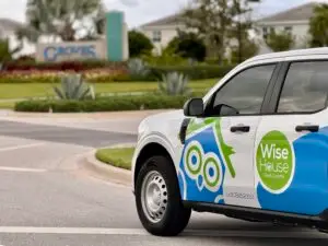 Wise House Pest Control technician vehicle in White City, Florida